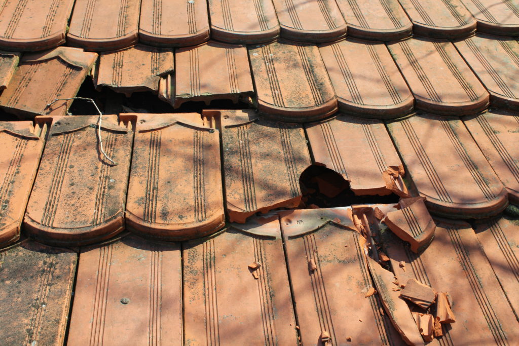 Cracked roofing tiles