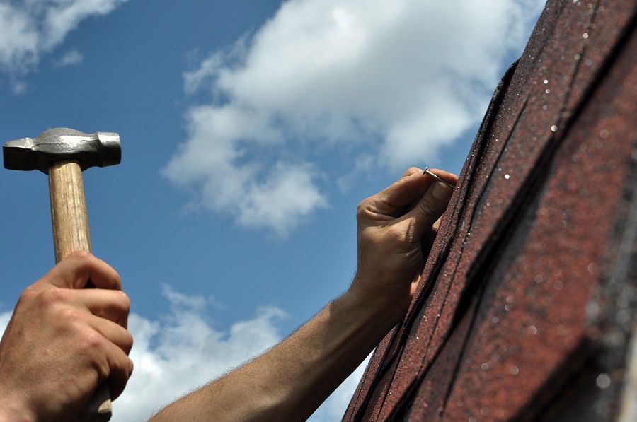 Nailing Shingles on Roof